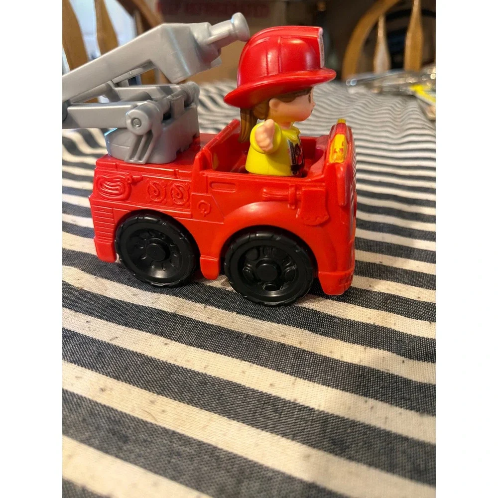 Fisher-Price Little People Fire Truck Red Vehicle with Firefighter Erika Figure